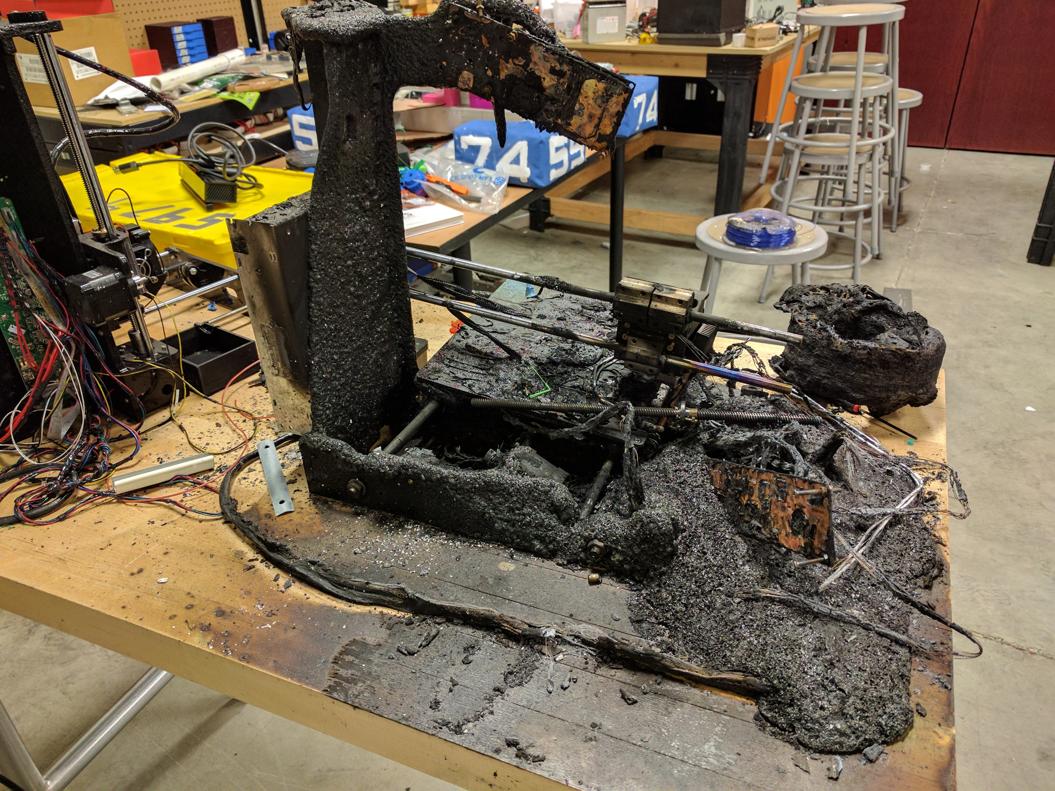 Back view of the 3D printer that melted