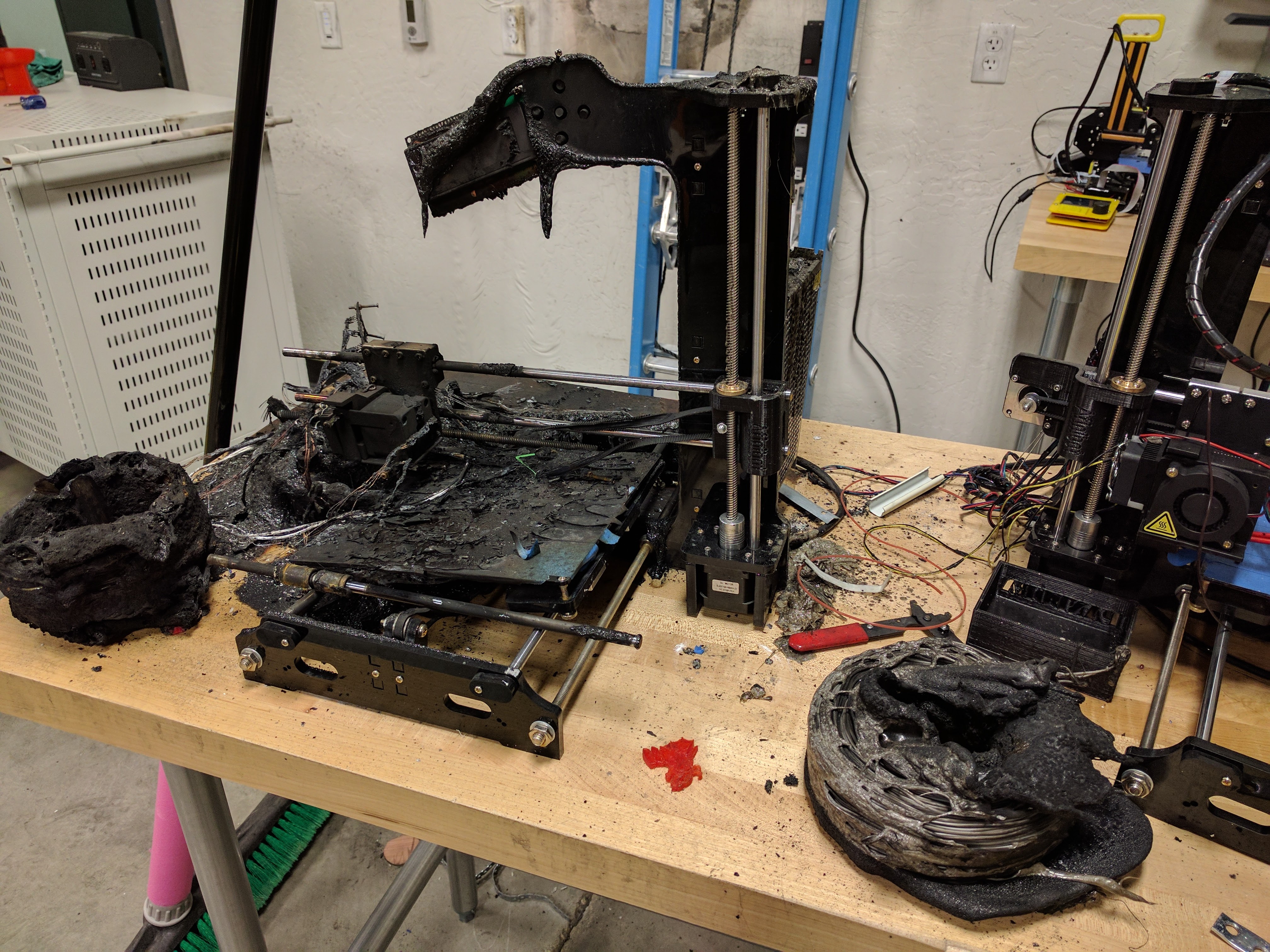 Front view of the 3D printer that melted